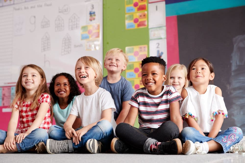 Children sitting in a classroom